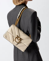 Love Bag quilted crossbody bag with chevron motif and logo - | Pinko