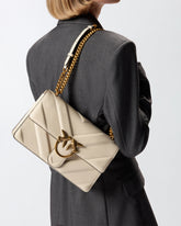 Medium Love Bag pebbled leather crossbody bag with V-shaped pattern and logo - White | Pinko