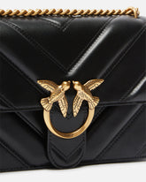 Medium Love Bag pebbled leather crossbody bag with V-shaped pattern and logo - Black | Pinko
