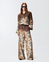 Fluid trousers with tiger print - | Pinko