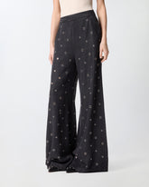 Wide-leg jeans in dark denim with eyelets - | Pinko