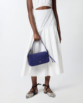 Medium crossbody bowler bag in crocodile-print leather - Purple | Pinko
