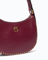 Mini Half Moon shoulder bag in new biker leather with mini studs - | Pinko
