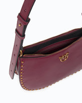 Mini Half Moon shoulder bag in new biker leather with mini studs - | Pinko