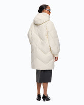 Long quilted down jacket with hood - | Pinko