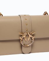Love Bag One medium crossbody bag in leather with jewel buckle - Beige | Pinko