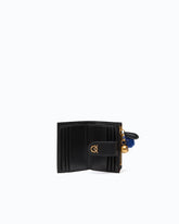 Multi-purpose leather wallet with pompom - Black | Pinko