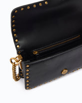 Baby Love Bag One Slouchy crossbody bag in leather with studs - Black | Pinko