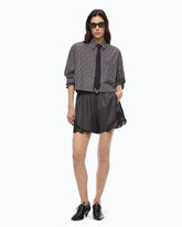 Fließende Shorts mit Spitzeneinsatz - | Pinko