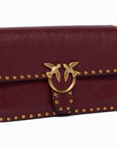Small Love One Slouchy crossbody bag in leather with studs - Pink | Pinko