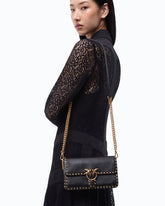 Small Love One Slouchy crossbody bag in leather with studs - Black | Pinko
