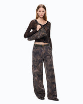 Cotton trousers with floral camouflage motif - | Pinko