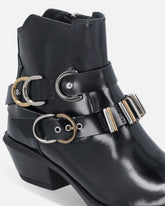 Studded cowboy boots - | Pinko