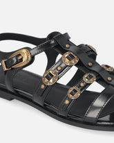 Flat sandals with straps and studs - | Pinko