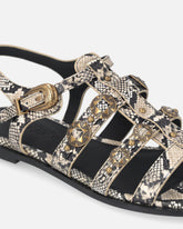 Flat leather sandals with python print and studs - | Pinko