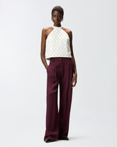 Trousers in jacquard with tie motif -  | Pinko