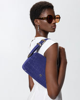 Medium crossbody bowler bag in crocodile-print leather -  | Pinko