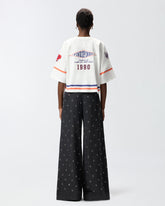 Cropped T-shirt with V-neck and branded patches -  | Pinko