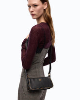 Mini Half Moon Horizontal crossbody bag in new biker leather with mini studs -  | Pinko