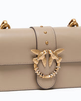 Mini Love Bag One crossbody bag in leather with jewel buckle - Beige | Pinko