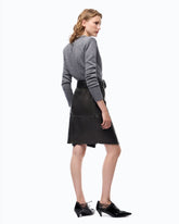 Leather-effect knee-length skirt with belt and slit -  | Pinko