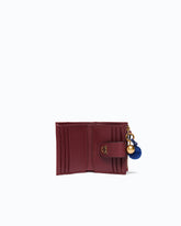 Multi-purpose leather wallet with pompom -  | Pinko