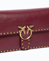 Medium Love One Slouchy crossbody bag in leather with studs - Pink | Pinko