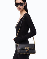 Medium Love One Slouchy crossbody bag in leather with studs - Black | Pinko