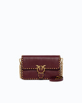 Small Love One Slouchy crossbody bag in leather with studs - Pink | Pinko