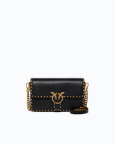 Small Love One Slouchy crossbody bag in leather with studs - Black | Pinko
