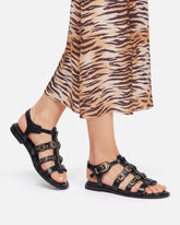 Flat sandals with straps and studs -  | Pinko